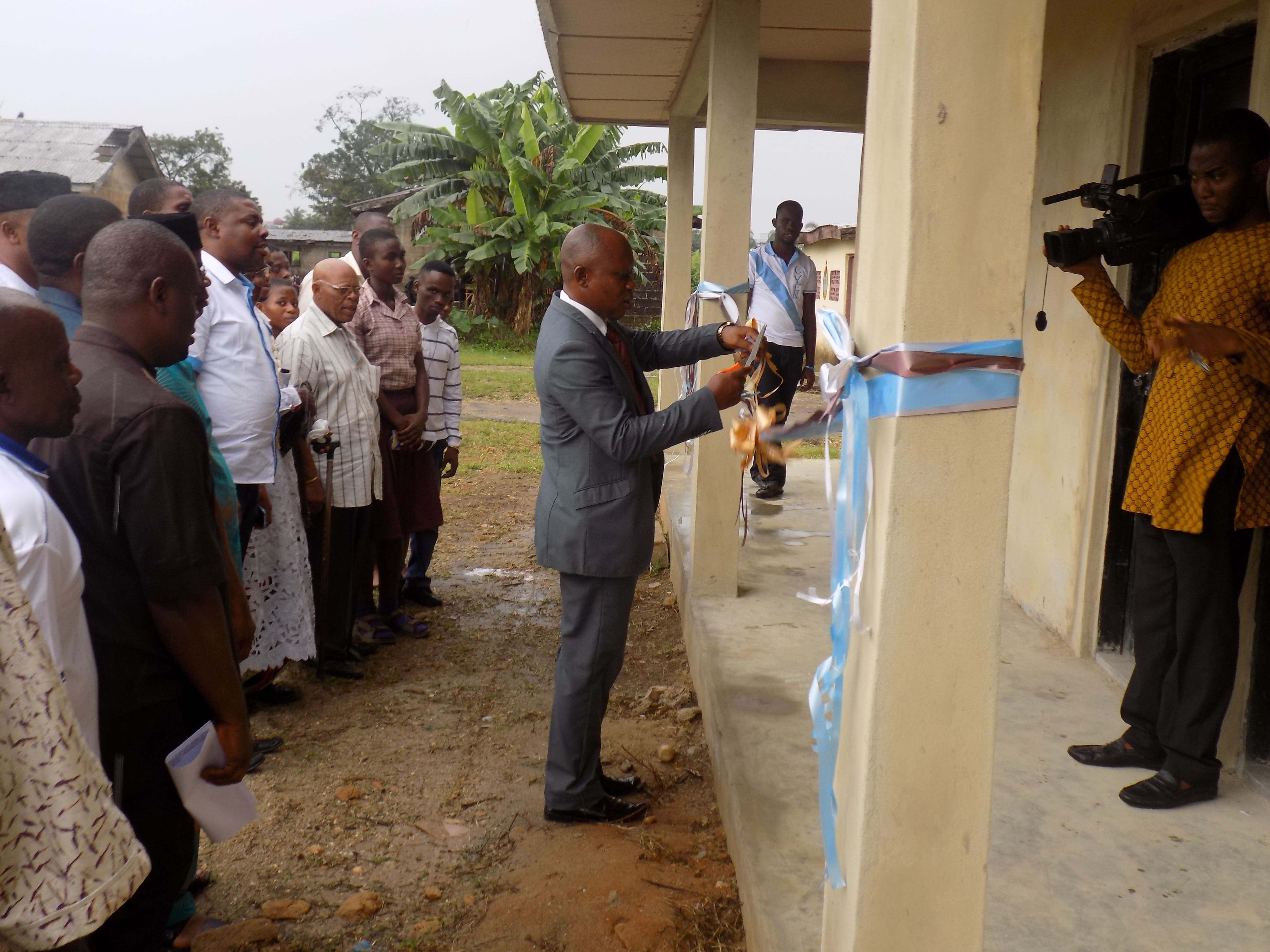 Commissioning of the two classrooms block by representative from Ministry of Education and CYEN Team.