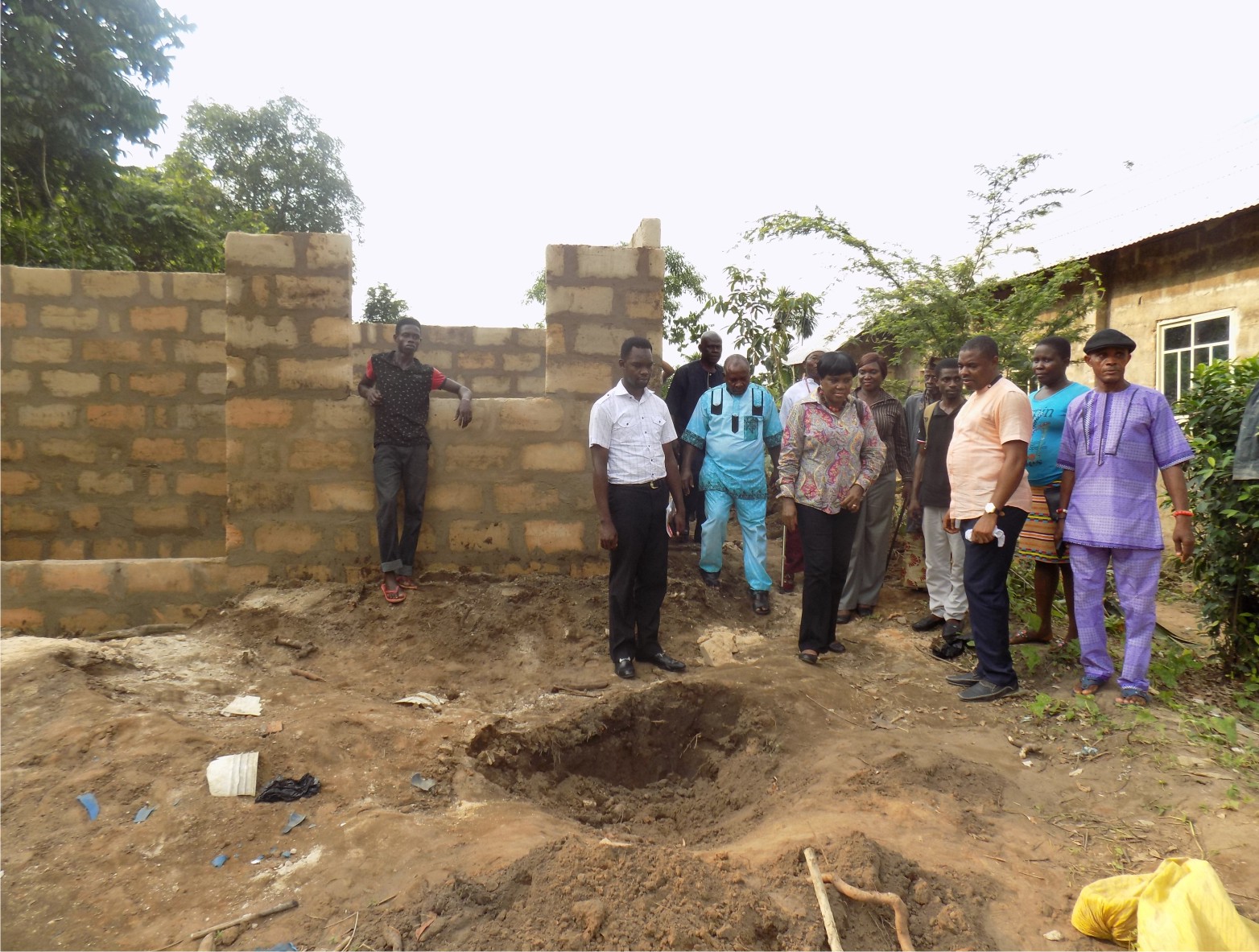 Monitoring of the construction of the two rooms apartment by CYEN, The community leaders, LOPIN Region 1 Project Management Team